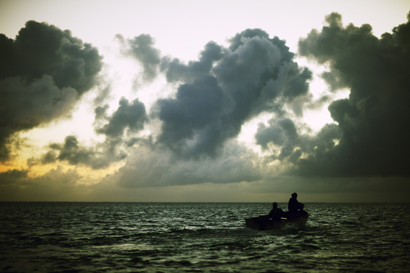 Beginning of a labor day, fisherman, Cargados Carajos, Mauritius, Indian Ocean